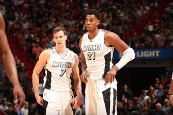 MIAMI, FL - DECEMBER 16:  Goran Dragic #7 and Hassan Whiteside #21 of the Miami Heat look on during a game against the LA Clippers on December 16, 2016 at American Airlines Arena in Miami, Florida. NOTE TO USER: User expressly acknowledges and agrees that