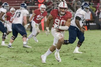 PALO ALTO, CA - NOVEMBER 26:  Solomon Thomas #90 of the Stanford Cardinal plays defense in an NCAA football game against the Rice Owls played on November 26, 2016 at Stanford Stadium in Palo Alto, California.  (Photo by David Madison/Getty Images)