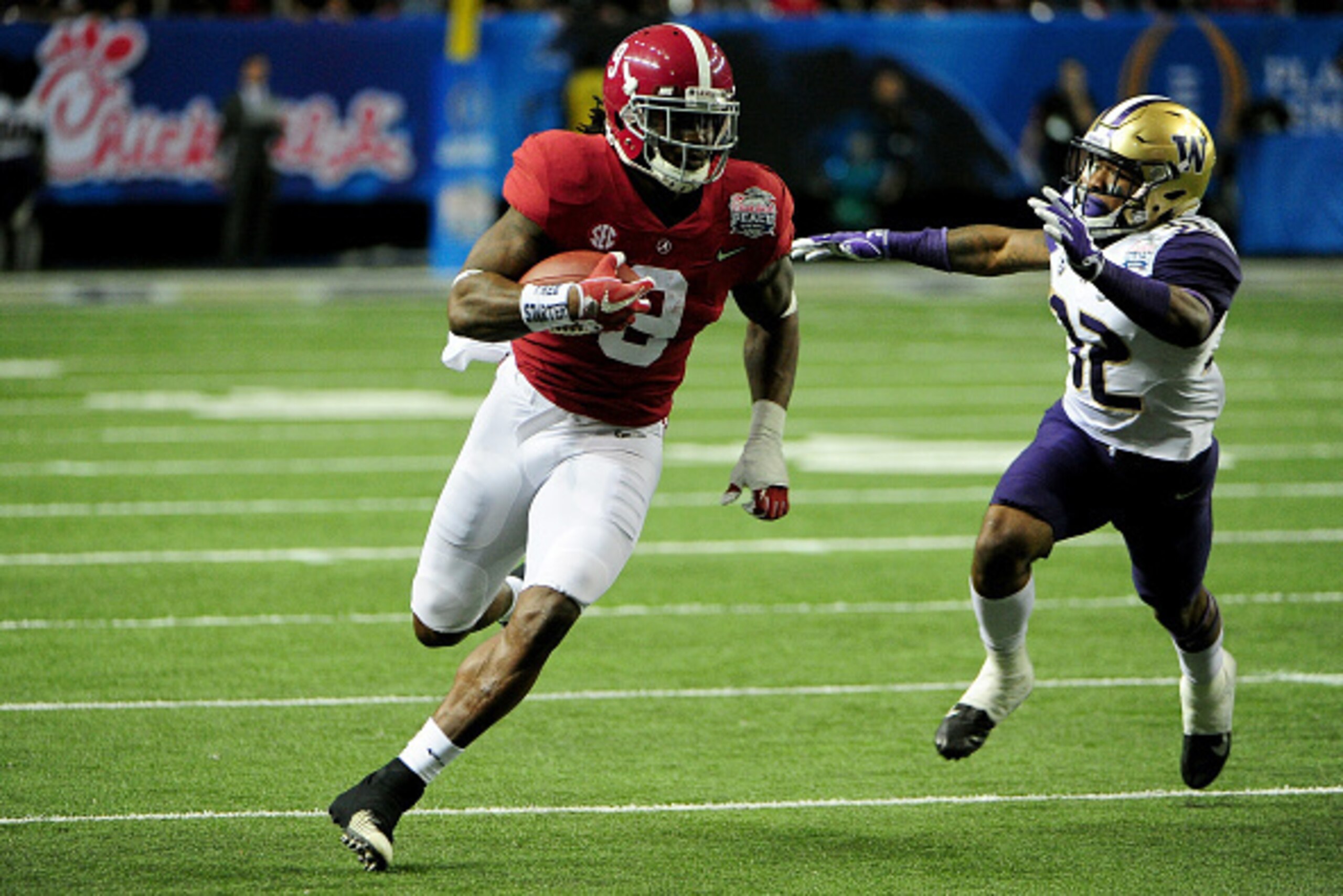 ATLANTA, GA - DECEMBER 31:  Bo Scarbrough #9 of the Alabama Crimson Tide runs the ball against the Washington Huskies during the 2016 Chick-fil-A Peach Bowl at the Georgia Dome on December 31, 2016 in Atlanta, Georgia.  (Photo by Scott Cunningham/Getty Im