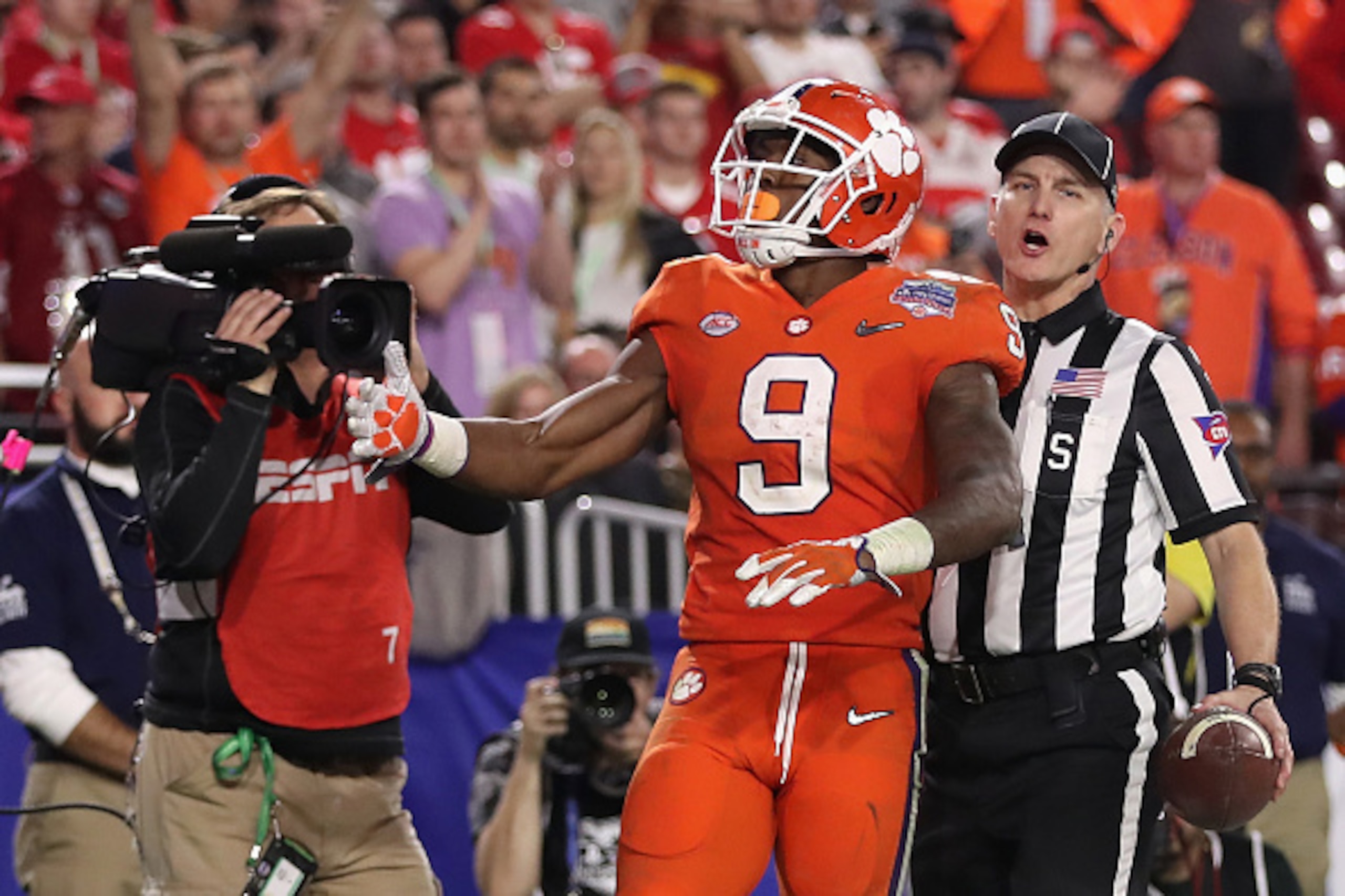GLENDALE, AZ - DECEMBER 31:  Running back Wayne Gallman #9 of the Clemson Tigers celebrates after scoring a seven yard rushing tochdown against the Ohio State Buckeyes during the Playstation Fiesta Bowl at University of Phoenix Stadium on December 31, 201