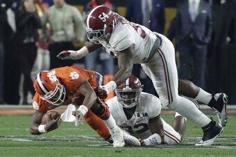 Tomlinson taking down Clemson QB Deshaun Watson, who he'll face again with a national championship on the line.