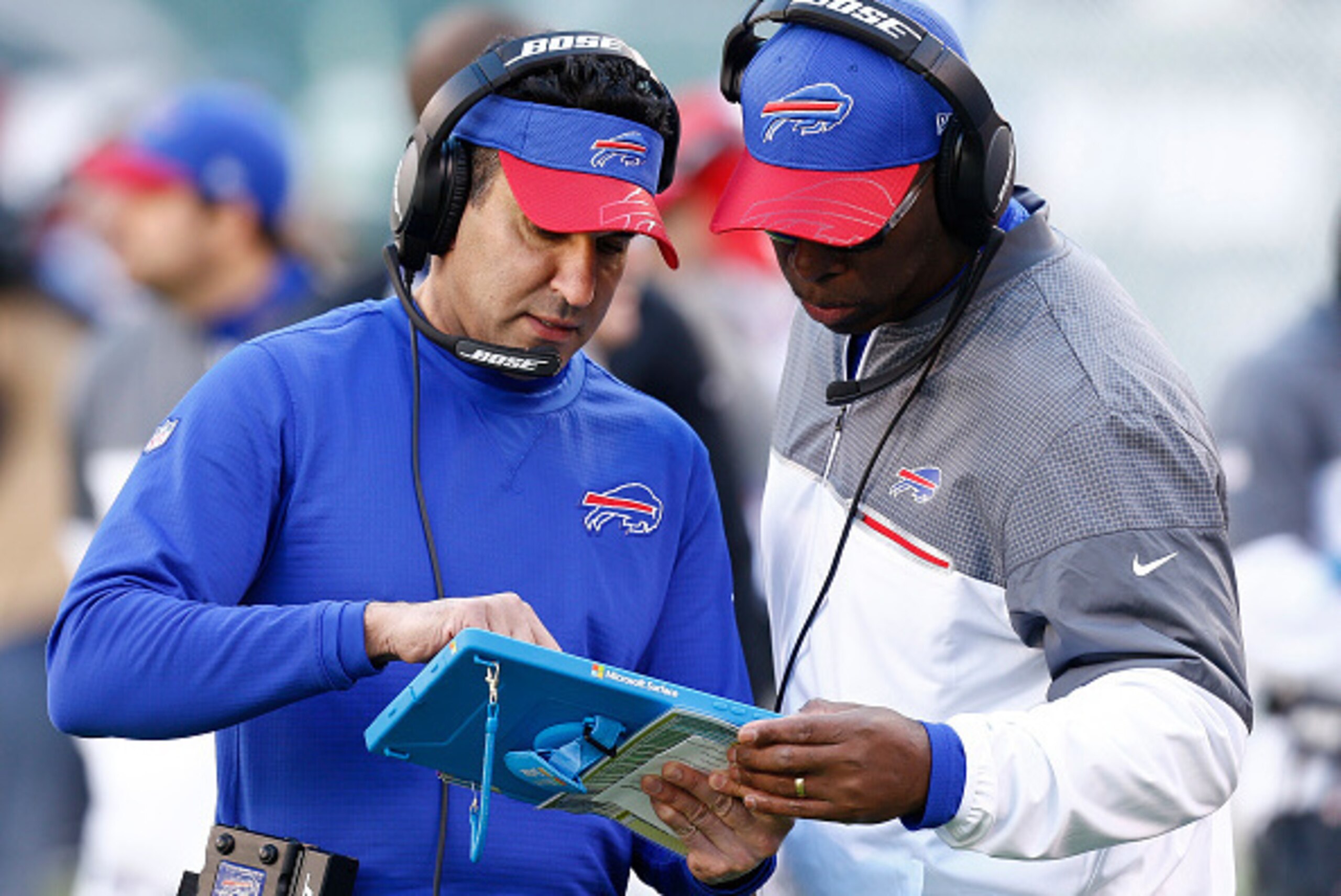 EAST RUTHERFORD, NJ - JANUARY 01: Head coach Anthony Lynn of the Buffalo Bills talks with wide receivers coach Sanjay Lal against the New York Jets at MetLife Stadium on January 1, 2017 in East Rutherford, New Jersey. (Photo by Jeff Zelevansky/Getty Ima EAST RUTHERFORD, NJ - JANUARY 01: Head coach Anthony Lynn of the Buffalo Bills talks with wide receivers coach Sanjay Lal against the New York Jets at MetLife Stadium on January 1, 2017 in East Rutherford, New Jersey. (Photo by Jeff Zelevansky/Getty Ima