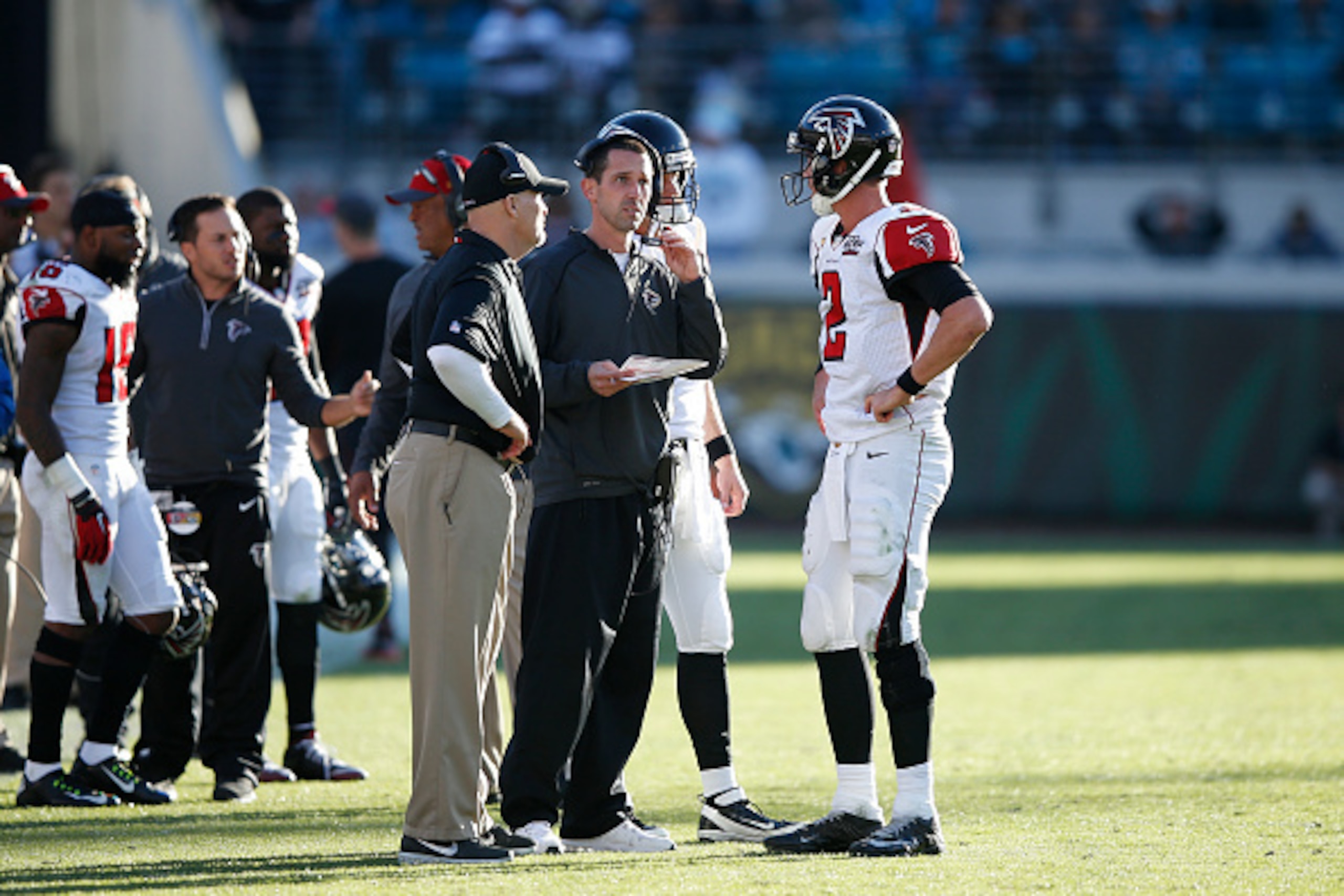 JACKSONVILLE, FL - DECEMBER 20: Matt Ryan #2 of the Atlanta Falcons talks to offensive coordinator Kyle Shanahan and head coach Dan Quinn during the game against the Jacksonville Jaguars at EverBank Field on December 20, 2015 in Jacksonville, Florida. The JACKSONVILLE, FL - DECEMBER 20: Matt Ryan #2 of the Atlanta Falcons talks to offensive coordinator Kyle Shanahan and head coach Dan Quinn during the game against the Jacksonville Jaguars at EverBank Field on December 20, 2015 in Jacksonville, Florida. The