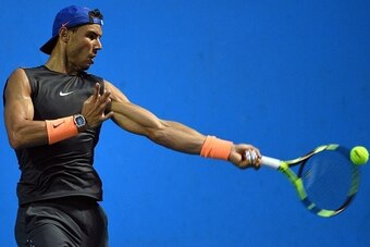 Rafael Nadal of Spain takes part in a training session at the Brisbane International tennis tournament in Brisbane on January 2, 2017. / AFP / SAEED KHAN / --IMAGE RESTRICTED TO EDITORIAL USE - STRICTLY NO COMMERCIAL USE--        (Photo credit should read