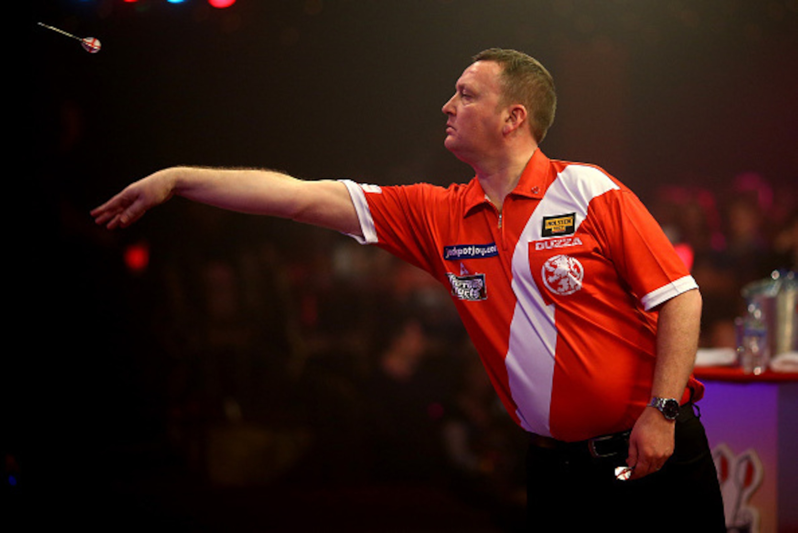 FRIMLEY, ENGLAND - JANUARY 10: Glen Durrant of England in action during his semi final match against Martin Adams of England during the BDO Lakeside World Professional Darts Championships on Day Eight at The Lakeside Country Club on January 10, 2015 in Fr