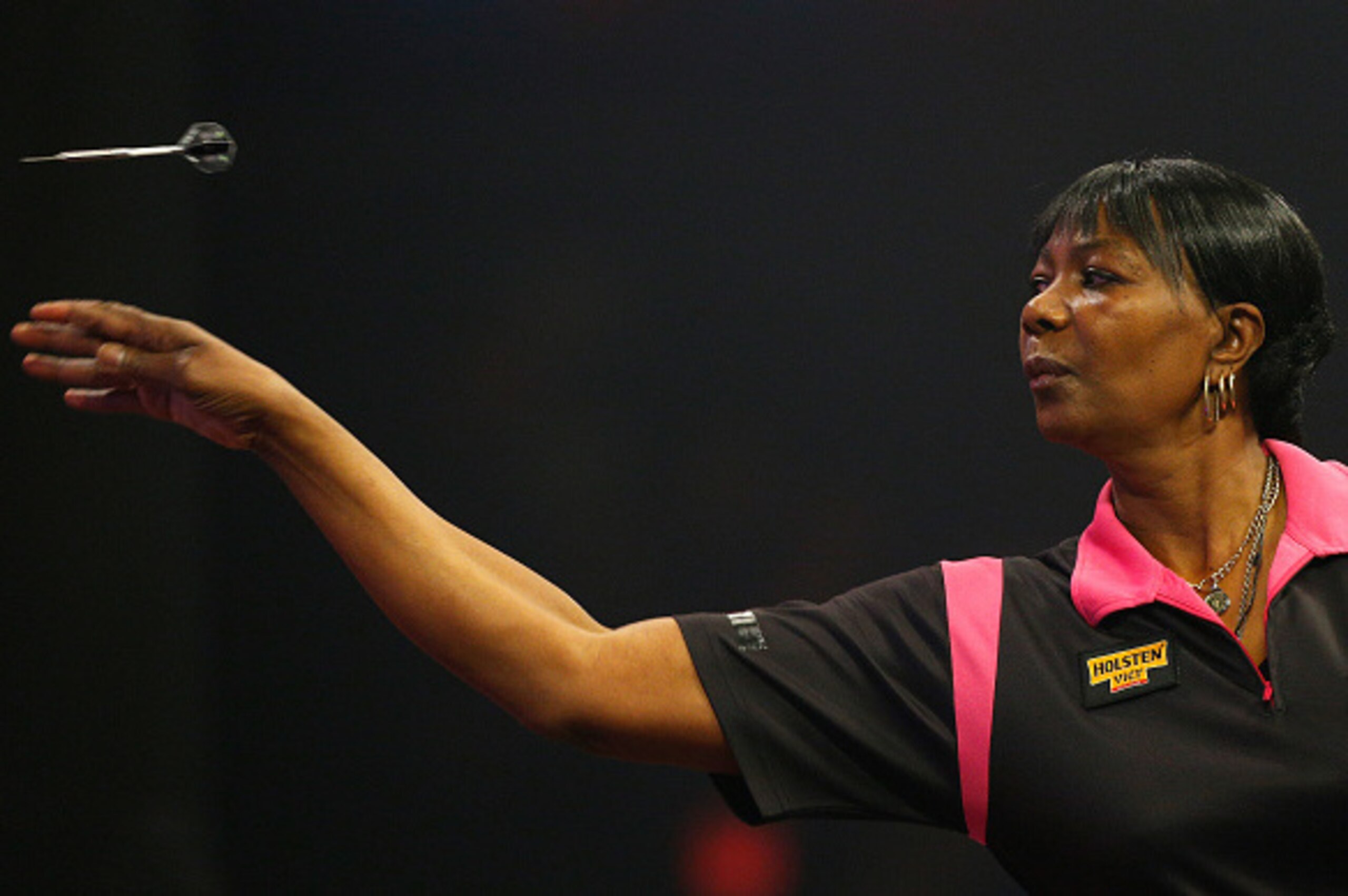 FRIMLEY, ENGLAND - JANUARY 03: Deta Hedman of England throws during her first round match against Lisa Ashton of England on day one of the BDO Lakeside World Professional Darts Championships at the Lakeside Complex on January 3, 2015 in Frimley, England. 