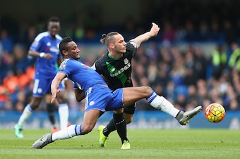 LONDON, ENGLAND - MARCH 05:  John Mikel Obi of Chelsea and Marko Arnautovic of Stoke City compete for the ball during the Barclays Premier League match between Chelsea and Stoke City at Stamford Bridge on March 5, 2016 in London, England.  (Photo by Clive