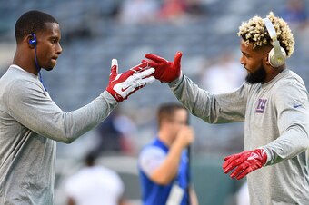 EAST RUTHERFORD, NJ - AUGUST 27:  (L-R) Victor Cruz and Odell Beckham of the New York Giants react prior to the preseason game against the New York Jets at MetLife Stadium on August 27, 2016 in East Rutherford, New Jersey.  (Photo by Rich Barnes/Getty Ima