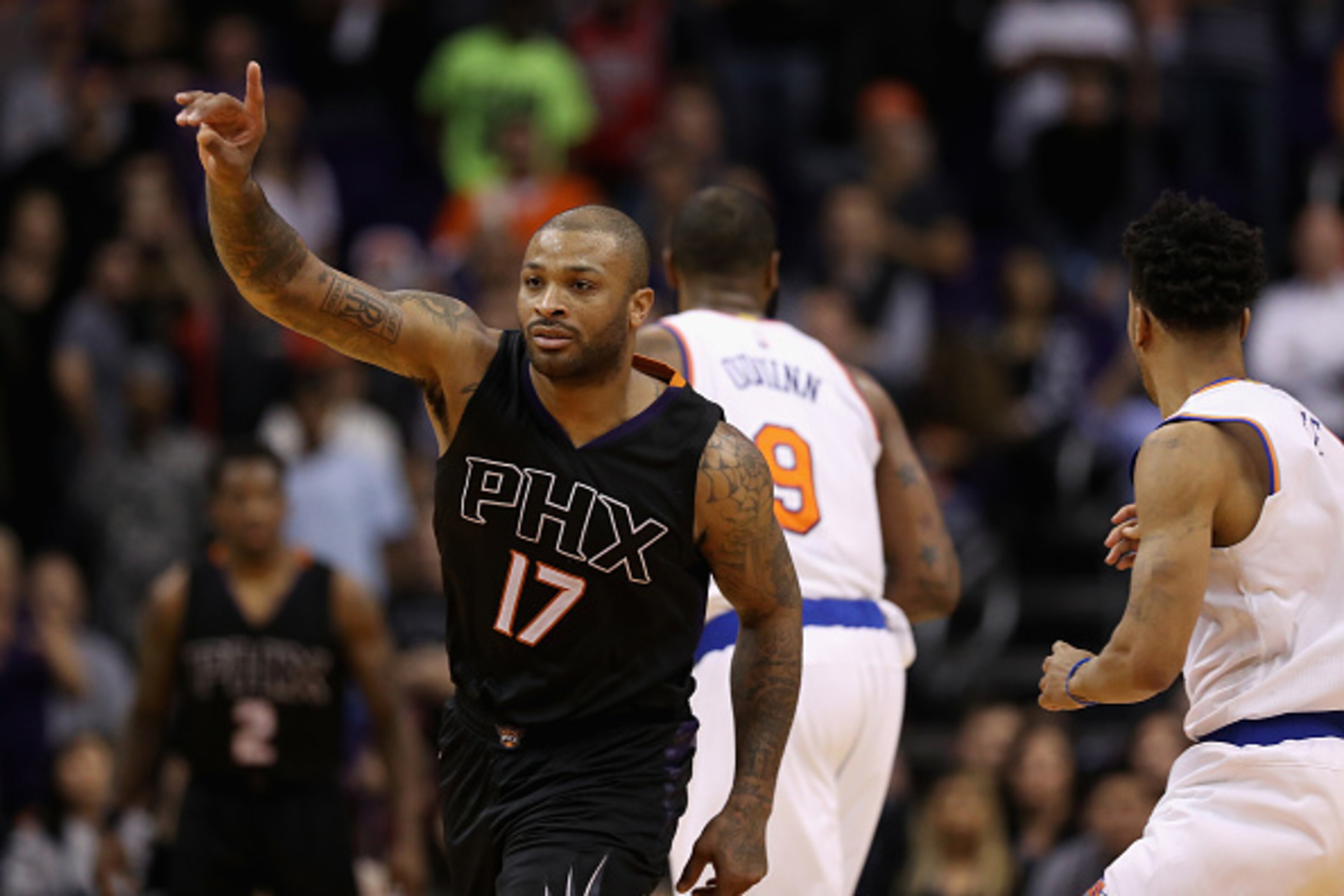 PHOENIX, AZ - DECEMBER 13:  P.J. Tucker #17 of the Phoenix Suns reacts during overtime of the NBA game against the New York Knicks at Talking Stick Resort Arena on December 13, 2016 in Phoenix, Arizona.  The Suns defeated the Knicks 113-111 in overtime.  