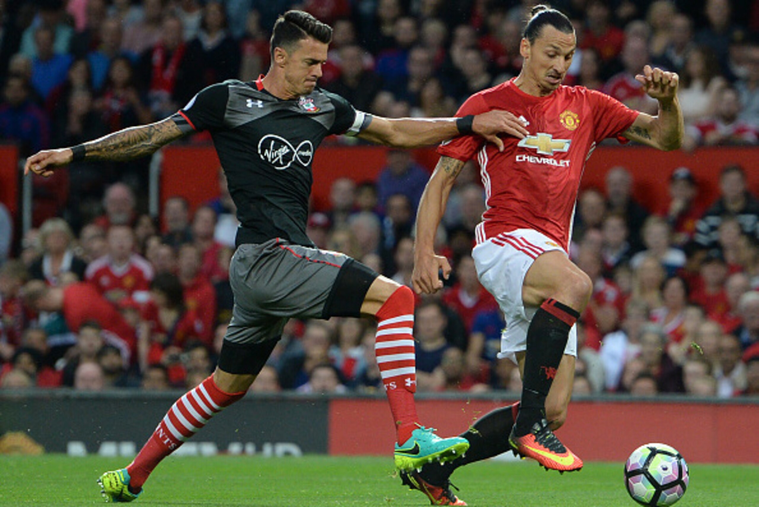 Manchester United's Swedish striker Zlatan Ibrahimovic (R) vies with Southampton's Portuguese defender Jose Fonte during the English Premier League football match between Manchester United and Southampton at Old Trafford in Manchester, north west England, Manchester United's Swedish striker Zlatan Ibrahimovic (R) vies with Southampton's Portuguese defender Jose Fonte during the English Premier League football match between Manchester United and Southampton at Old Trafford in Manchester, north west England,