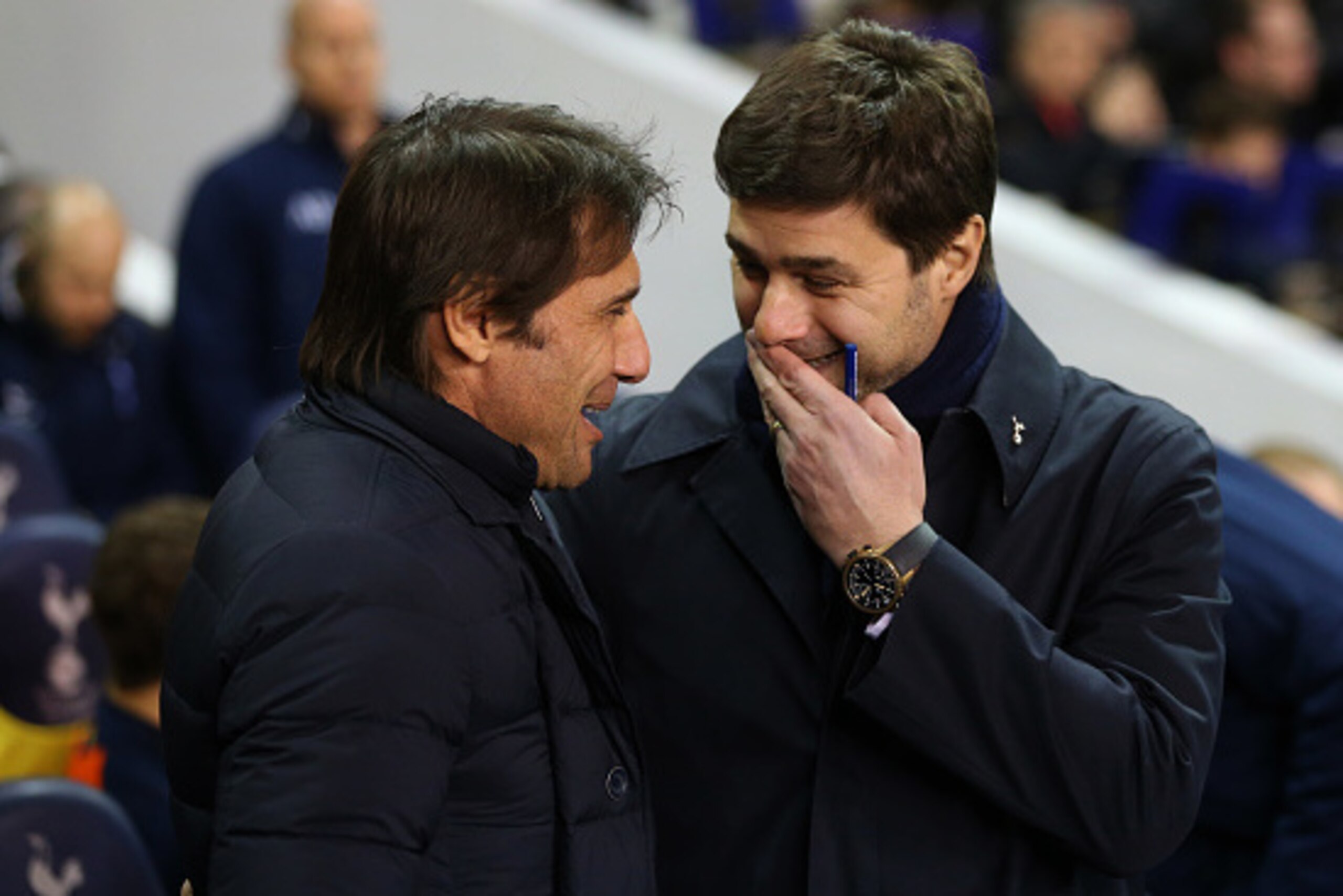 LONDON, ENGLAND - JANUARY 04: Antonio Conte manager of Chelsea and Mauricio Pochettino manager of Tottenham Hotspur during the Premier League match between Tottenham Hotspur and Chelsea at White Hart Lane on January 4, 2017 in London, England. (Photo by C