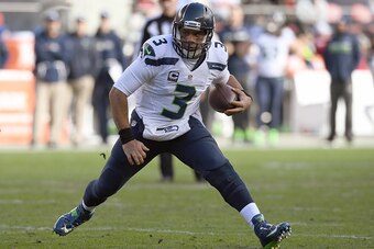 SANTA CLARA, CA - JANUARY 01:  Russell Wilson #3 of the Seattle Seahawks runs with the ball against the San Francisco 49ers during the second quarter of their NFL football game at Levi's Stadium on January 1, 2017 in Santa Clara, California.  (Photo by Th