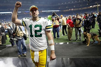 DETROIT, MI - JANUARY 1: Quarterback Aaron Rodgers #12 of the Green Bay Packers raises his fist as he leaves the field after defeating the Detroit Lions 31-24 at Ford Field on January 1, 2017 in Detroit, Michigan (Photo by Gregory Shamus/Getty Images)