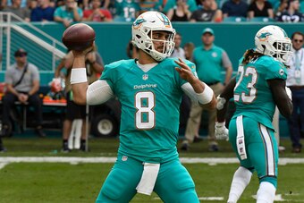 MIAMI GARDENS, FL - JANUARY 01: Matt Moore #8 of the Miami Dolphins drops back to pass during the 3rd quarter against the New England Patriots at Hard Rock Stadium on January 1, 2017 in Miami Gardens, Florida. (Photo by Eric Espada/Getty Images)