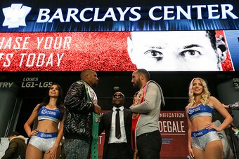 NEW YORK, NY - NOVEMBER 16:  WBC Super Middleweight World Champion Badou Jack (L) and IBF Super Middleweight World Champion James DeGale pose for a photo with President of Mayweather Promotions Floyd Mayweather after the press conference announcing the Su