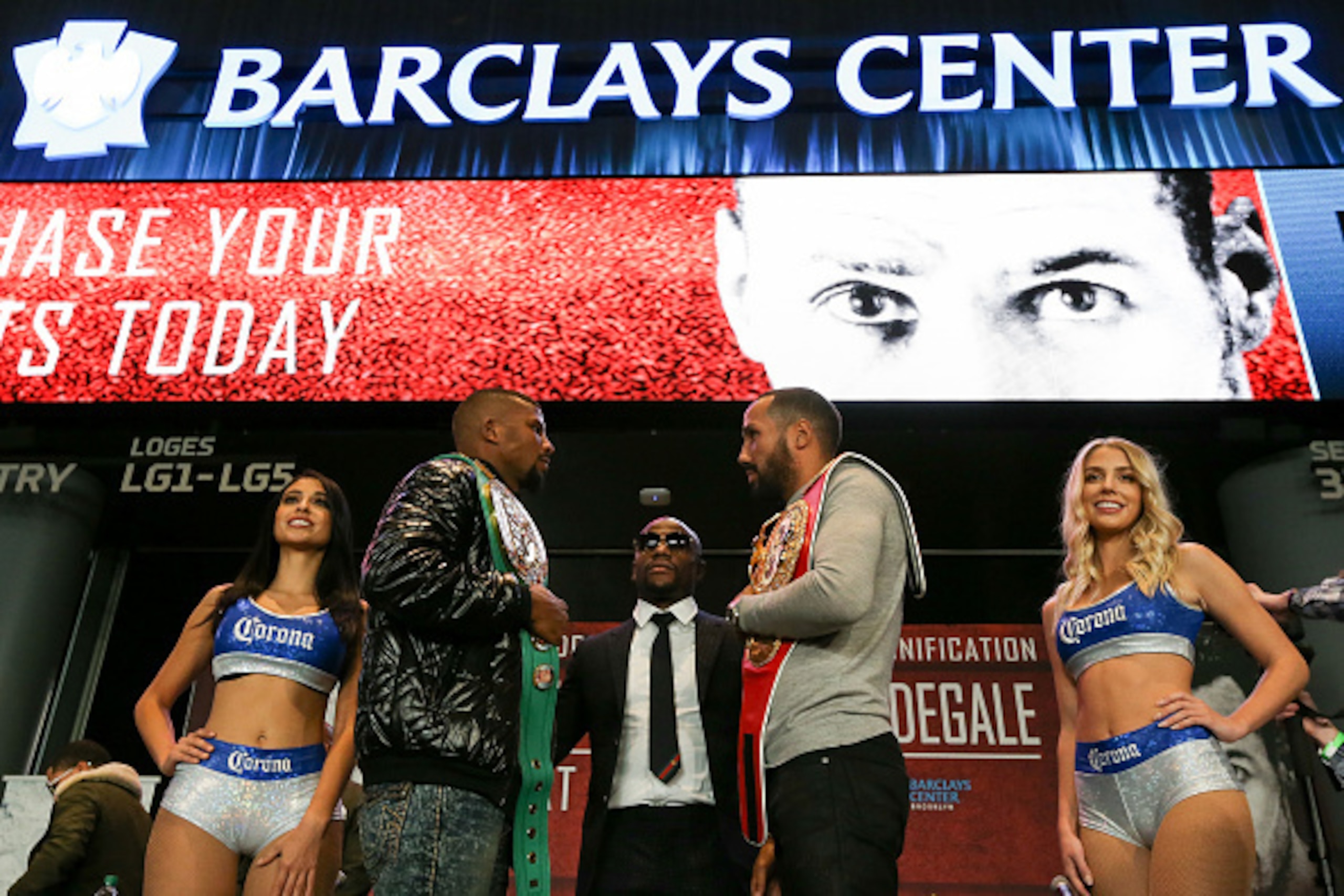 NEW YORK, NY - NOVEMBER 16:  WBC Super Middleweight World Champion Badou Jack (L) and IBF Super Middleweight World Champion James DeGale pose for a photo with President of Mayweather Promotions Floyd Mayweather after the press conference announcing the Su