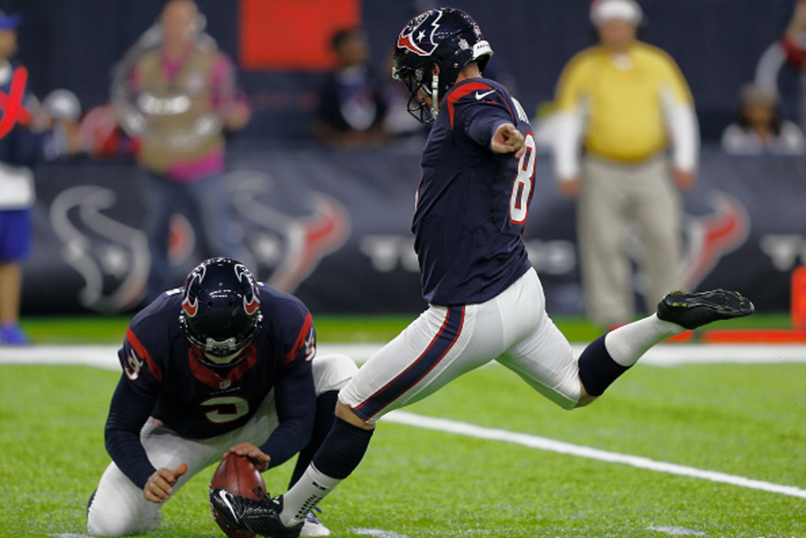 HOUSTON, TX - DECEMBER 24: Nick Novak #8 of the Houston Texans hits a 22 yard field goal out of the hold of Shane Lechler #9 fourth quarter against the Cincinnati Bengals at NRG Stadium on December 24, 2016 in Houston, Texas. (Photo by Bob Levey/Getty Ima