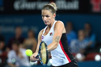 BRISBANE, AUSTRALIA - JANUARY 07:  Karolina Pliskova of the Czech Republic plays a backhand against Alize Cornet of France during the Women's Final on day seven of the 2017 Brisbane International at Pat Rafter Arena on January 7, 2017 in Brisbane, Austral