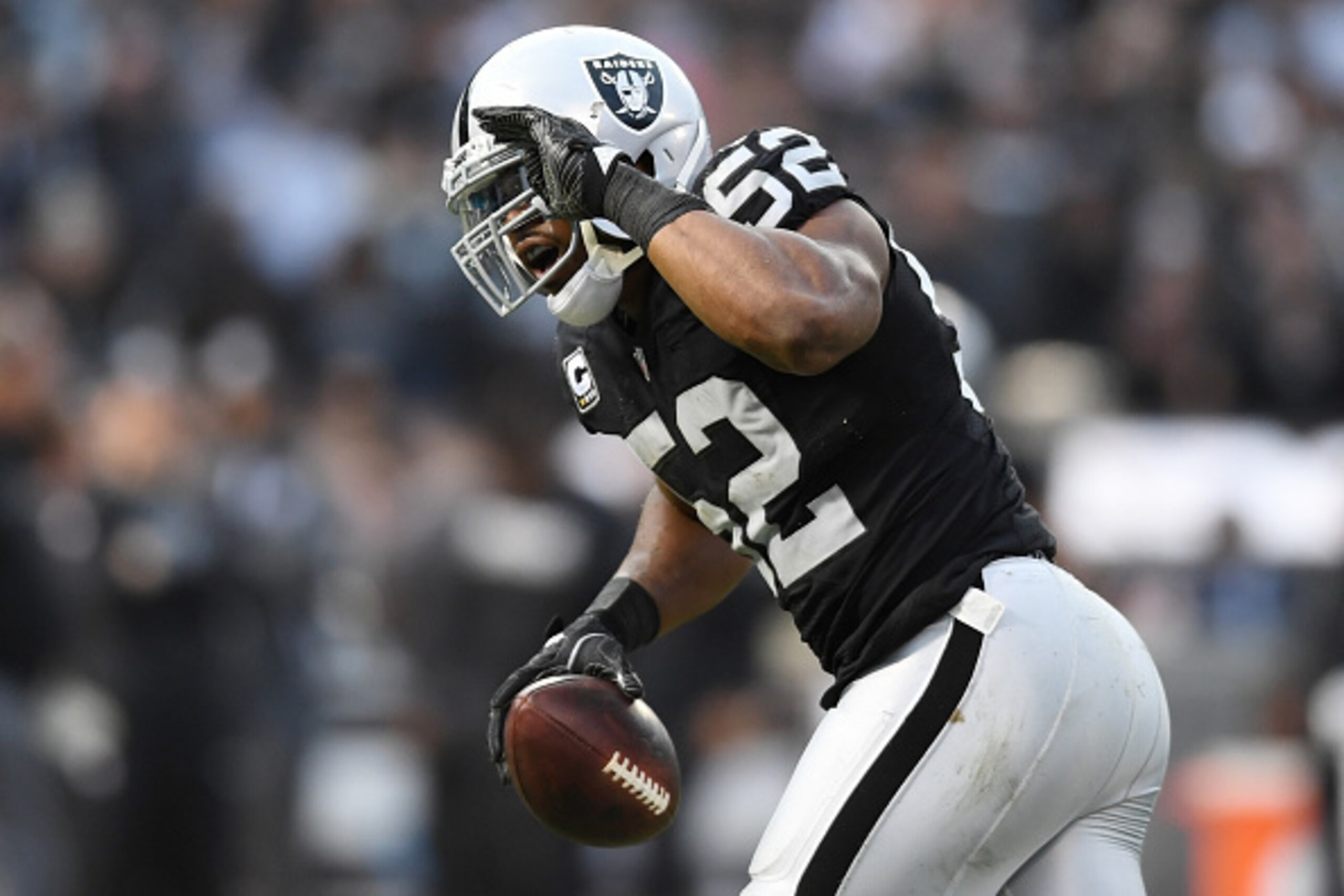 OAKLAND, CA - DECEMBER 04:  Khalil Mack #52 of the Oakland Raiders celebrates after a fumble recovery against the Buffalo Bills during their NFL game at Oakland Alameda Coliseum on December 4, 2016 in Oakland, California.  (Photo by Thearon W. Henderson/G