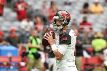 GLENDALE, AZ - SEPTEMBER 18:  Quarterback Mike Glennon #8 of the Tampa Bay Buccaneers warms up prior to the start of the NFL game against the Arizona Cardinals at University of Phoenix Stadium on September 18, 2016 in Glendale, Arizona.  (Photo by Norm Ha