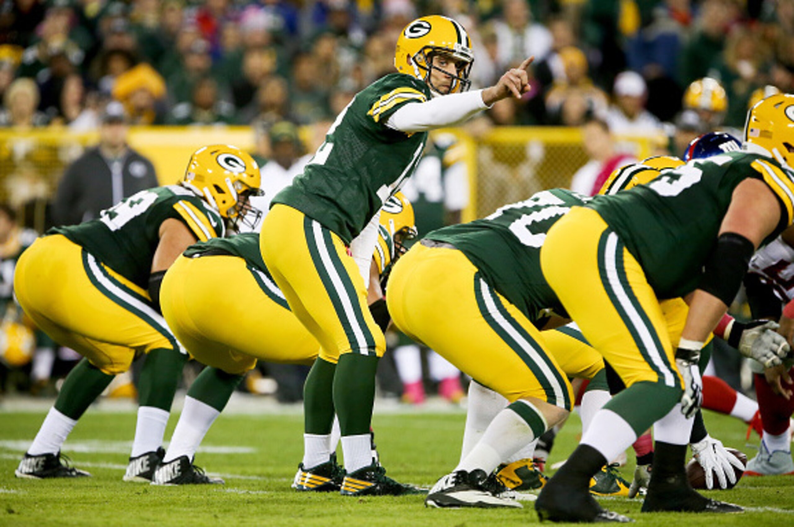 GREEN BAY, WI - OCTOBER 09:  Aaron Rodgers #12 of the Green Bay Packers calls out a play in the first quarter against the New York Giants at Lambeau Field on October 9, 2016 in Green Bay, Wisconsin. (Photo by Dylan Buell/Getty Images)