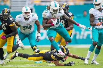 MIAMI GARDENS, FL - OCTOBER 16:  Running back Jay Ajayi #23 of the Miami Dolphins carries the ball during a NFL game against the Pittsburgh Steelers on October 16, 2016 at Hard Rock Stadium in Miami Gardens, Florida.  (Photo by Ronald C. Modra/Sports Imag