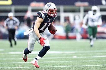 FOXBORO, MA - DECEMBER 24: Julian Edelman #11 of the New England Patriots carries the ball against the New York Jets during the first half at Gillette Stadium on December 24, 2016 in Foxboro, Massachusetts. (Photo by Maddie Meyer/Getty Images)