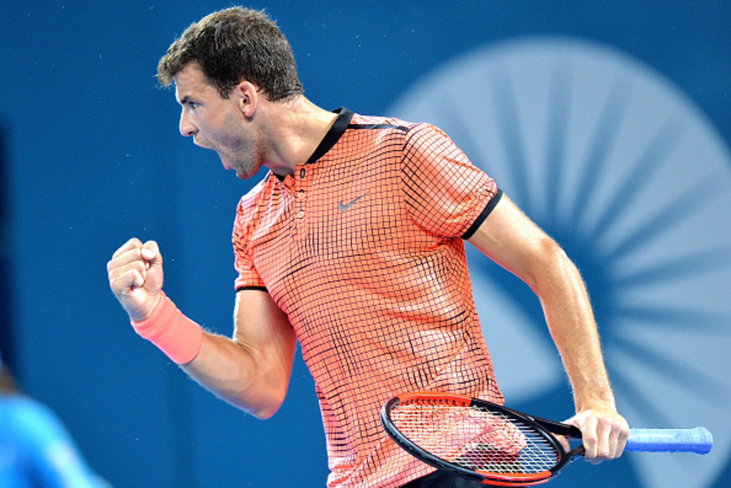 BRISBANE, AUSTRALIA - JANUARY 08:  Grigor Dimitrov of Bulgaria celebrates winning a point against Kei Nishikori of Japan during the Men's Final on day eight of the 2017 Brisbane International at Pat Rafter Arena on January 8, 2017 in Brisbane, Australia. 