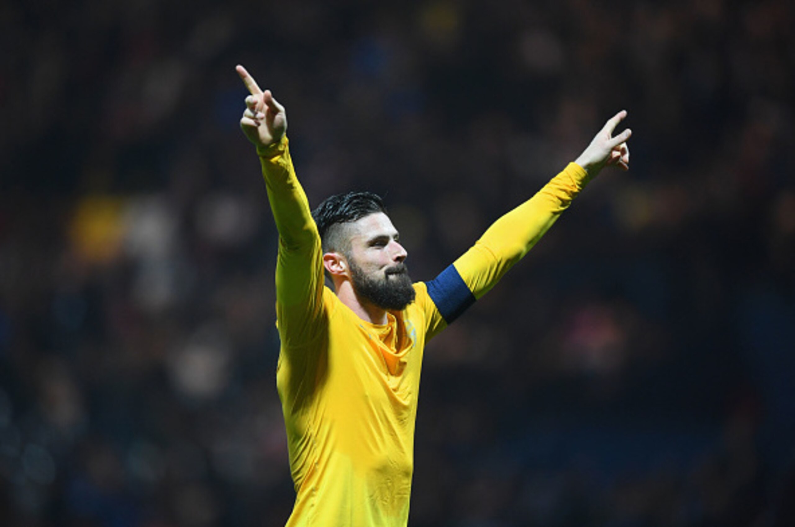 PRESTON, ENGLAND - JANUARY 07:  Olivier Giroud of Arsenal celebrates victory after the Emirates FA Cup Third Round match between Preston North End and Arsenal at Deepdale on January 7, 2017 in Preston, England.  (Photo by Michael Regan/Getty Images)