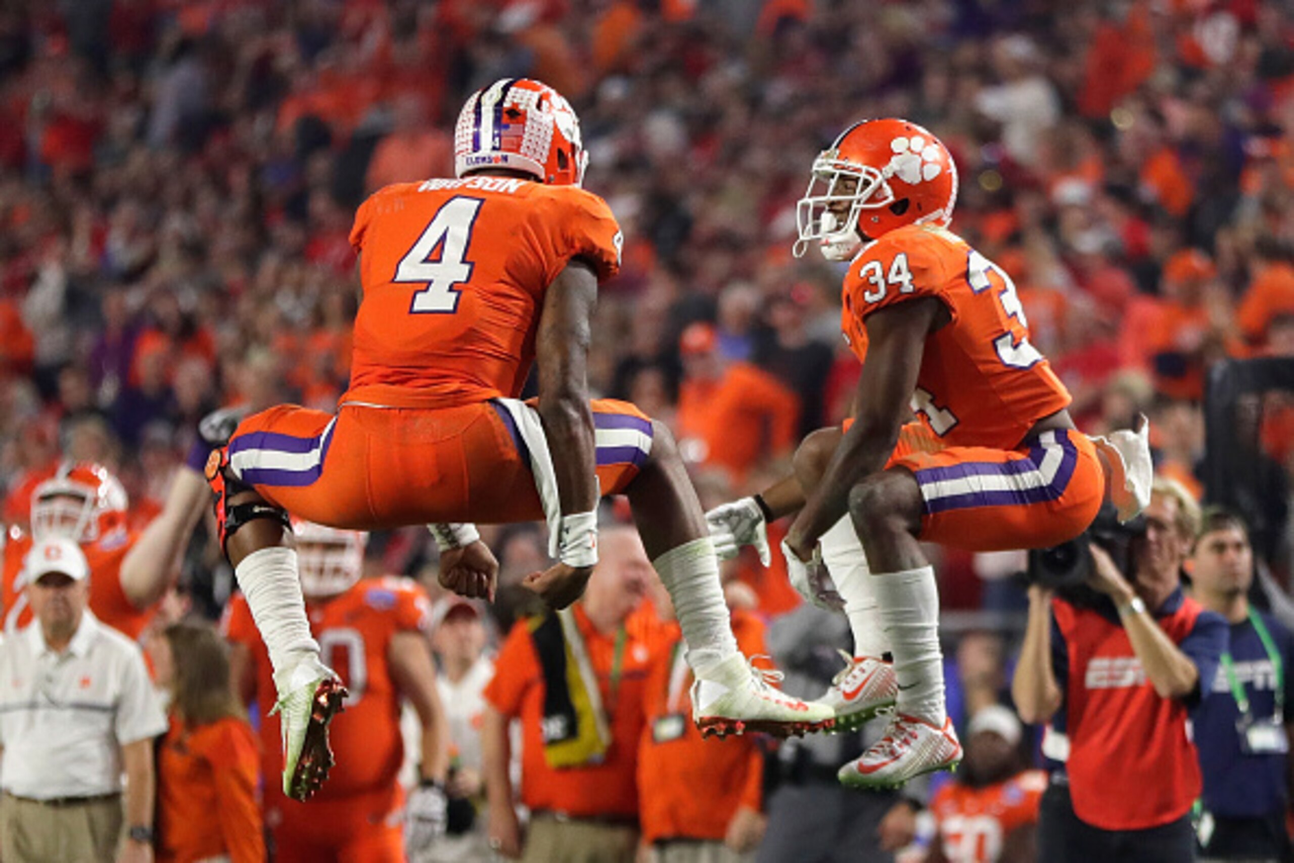 GLENDALE, AZ - DECEMBER 31:  Deshaun Watson #4 of the Clemson Tigers reacts after scoring a third quarter touchdown with teammate Ray-Ray McCloud #34 during the 2016 PlayStation Fiesta Bowl against the Ohio State Buckeyes at University of Phoenix Stadium 