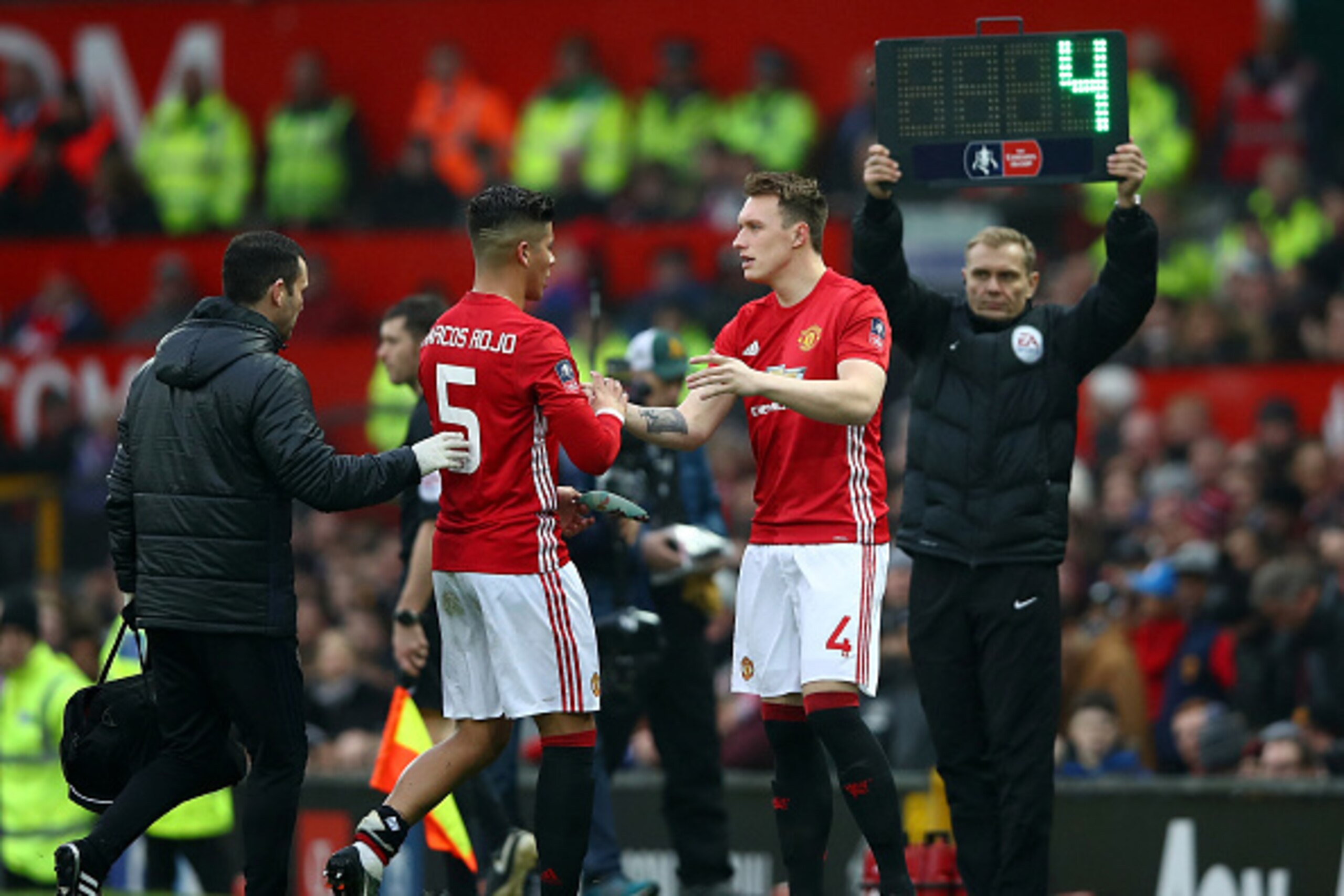 MANCHESTER, ENGLAND - JANUARY 07: Marcos Rojo of Manchester United is replaced by Phil Jones of Manchester United following an injury during the Emirates FA Cup third round match between Manchester United and Reading at Old Trafford on January 7, 2017 in MANCHESTER, ENGLAND - JANUARY 07: Marcos Rojo of Manchester United is replaced by Phil Jones of Manchester United following an injury during the Emirates FA Cup third round match between Manchester United and Reading at Old Trafford on January 7, 2017 in