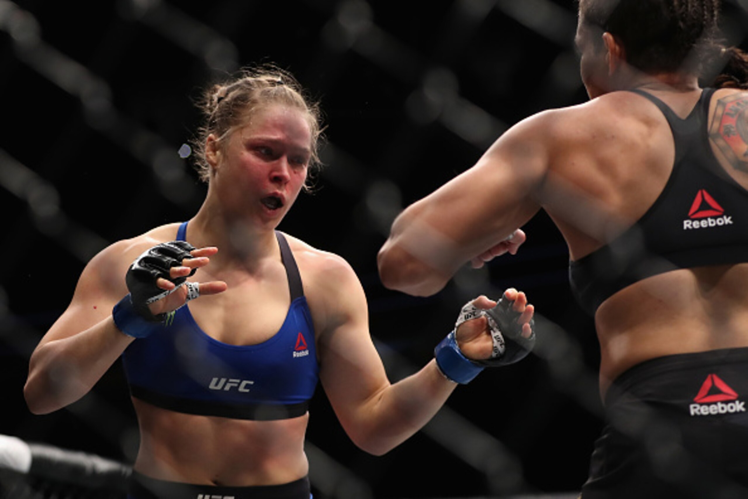 LAS VEGAS, NV - DECEMBER 30:  (L-R) Ronda Rousey and Amanda Nunes of Brazil face off in their UFC women's bantamweight championship bout during the UFC 207 event at T-Mobile Arena on December 30, 2016 in Las Vegas, Nevada.  (Photo by Christian Petersen/Ge