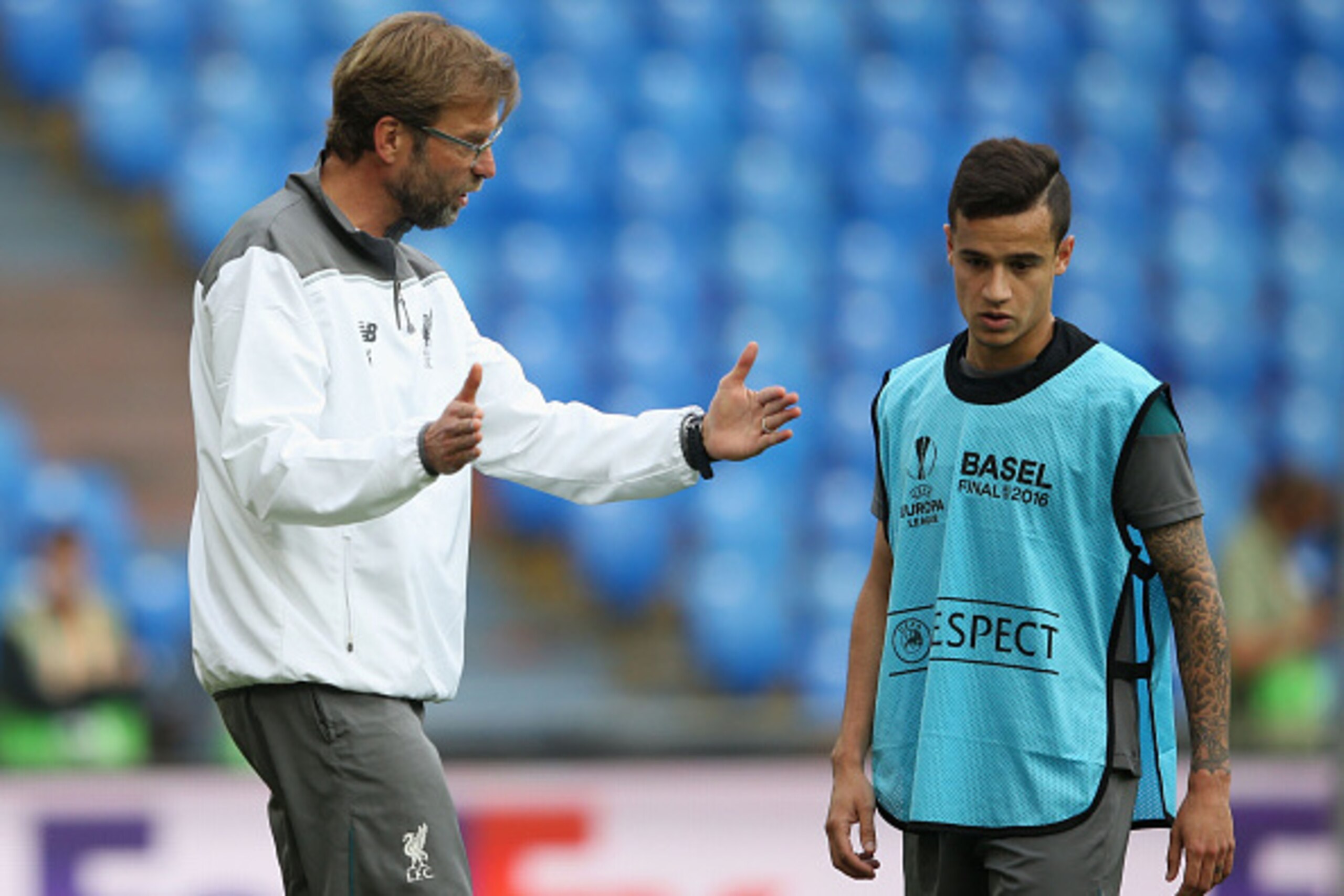 BASEL, SWITZERLAND - MAY 17:  Jurgen Klopp, manager of Liverpool talks with Philippe Coutinho during a Liverpool training session on the eve of the UEFA Europa League Final against Sevilla at St. Jakob-Park on May 17, 2016 in Basel, Switzerland.  (Photo b