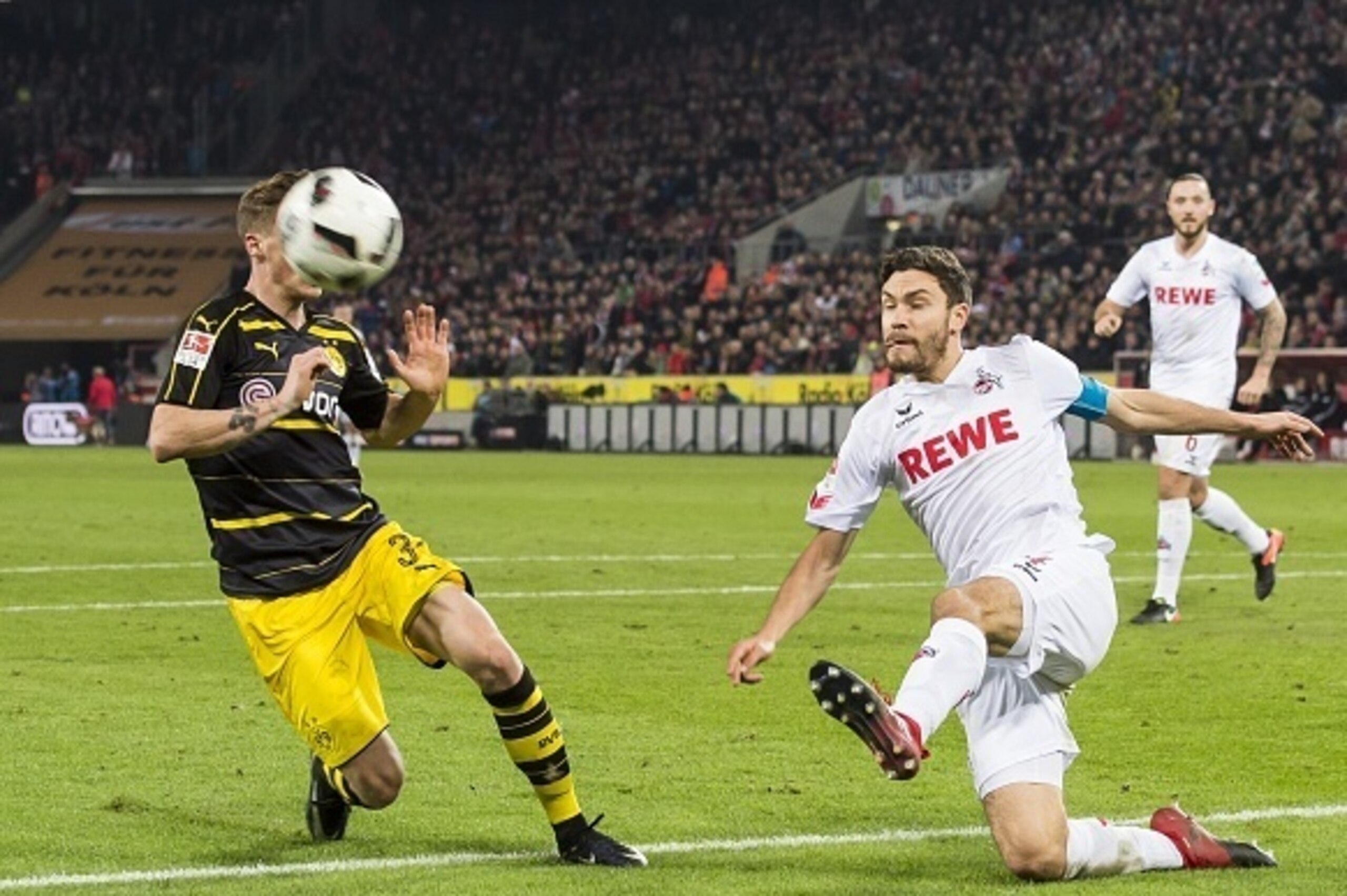 (L-R) Erik Durm of Borussia Dortmund, Jonas Hector of 1.FC Kolnduring the Bundesliga match between 1. FC Koln and Borussia Dortmund on December 10, 2016 at the RheinEnergie Stadium in Koln, Germany.(Photo by VI Images via Getty Images) (L-R) Erik Durm of Borussia Dortmund, Jonas Hector of 1.FC Kolnduring the Bundesliga match between 1. FC Koln and Borussia Dortmund on December 10, 2016 at the RheinEnergie Stadium in Koln, Germany.(Photo by VI Images via Getty Images)