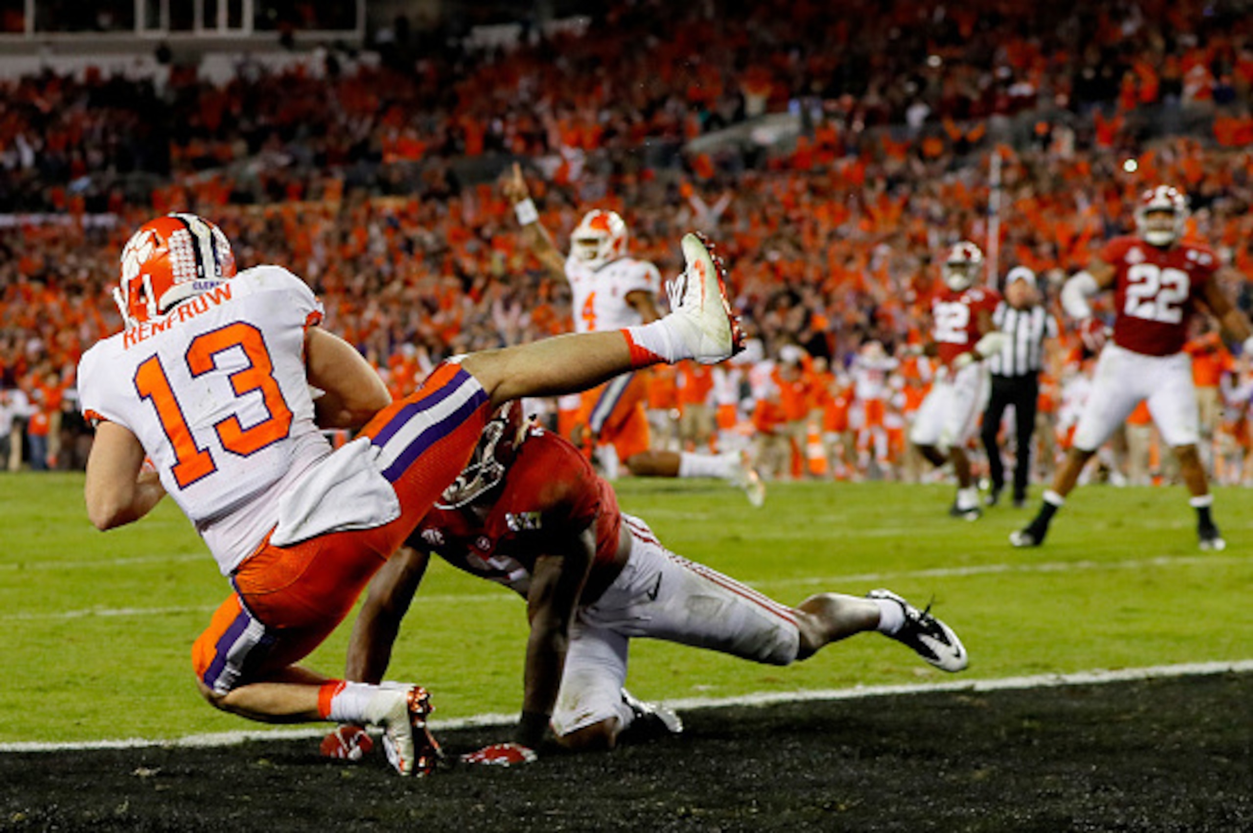 TAMPA, FL - JANUARY 09:  Wide receiver Hunter Renfrow #13 of the Clemson Tigers makes a 2-yard game-winning touchdown reception against defensive back Tony Brown #2 of the Alabama Crimson Tide during the fourth quarter of the 2017 College Football Playoff