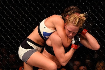 LAS VEGAS, NV - MARCH 05:  Miesha Tate (left) attempts to submit Holly Holm in their UFC women's bantamweight championship bout during the UFC 196 event inside MGM Grand Garden Arena on March 5, 2016 in Las Vegas, Nevada.  (Photo by Josh Hedges/Zuffa LLC/
