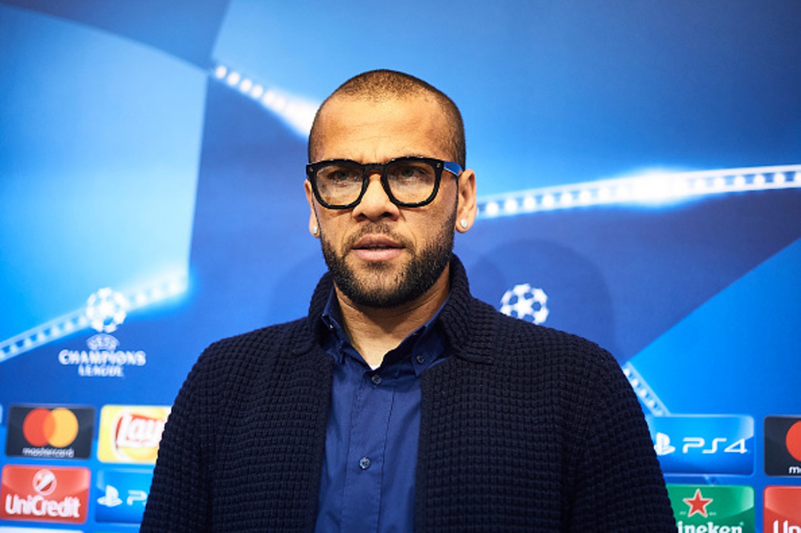 SEVILLE, SPAIN - NOVEMBER 21:  Dani Alves of Juventus attends to the press during the press conference prior to their match of UEFA Champions League between Sevilla FC vs  Juventus at the Sanchez Pizjuan Stadium on November 21, 2016 in Seville, Spain.  (P