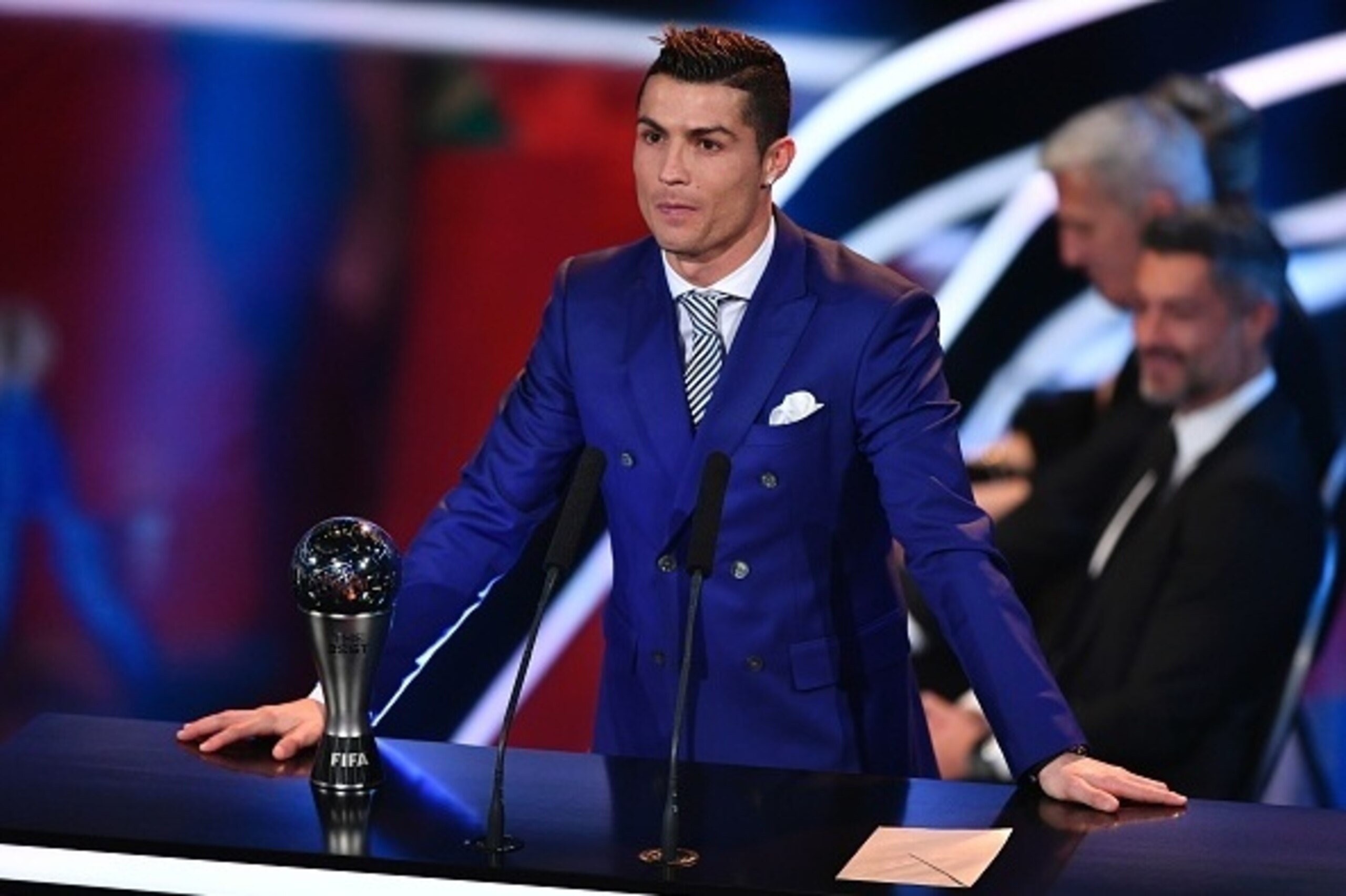 Real Madrid and Portugal's forward Cristiano Ronaldo stands next to his trophy after winning the The Best FIFA Mens Player of 2016 Award during The Best FIFA Football Awards ceremony, on January 9, 2017 in Zurich. / AFP / Fabrice COFFRINI        (Photo cr