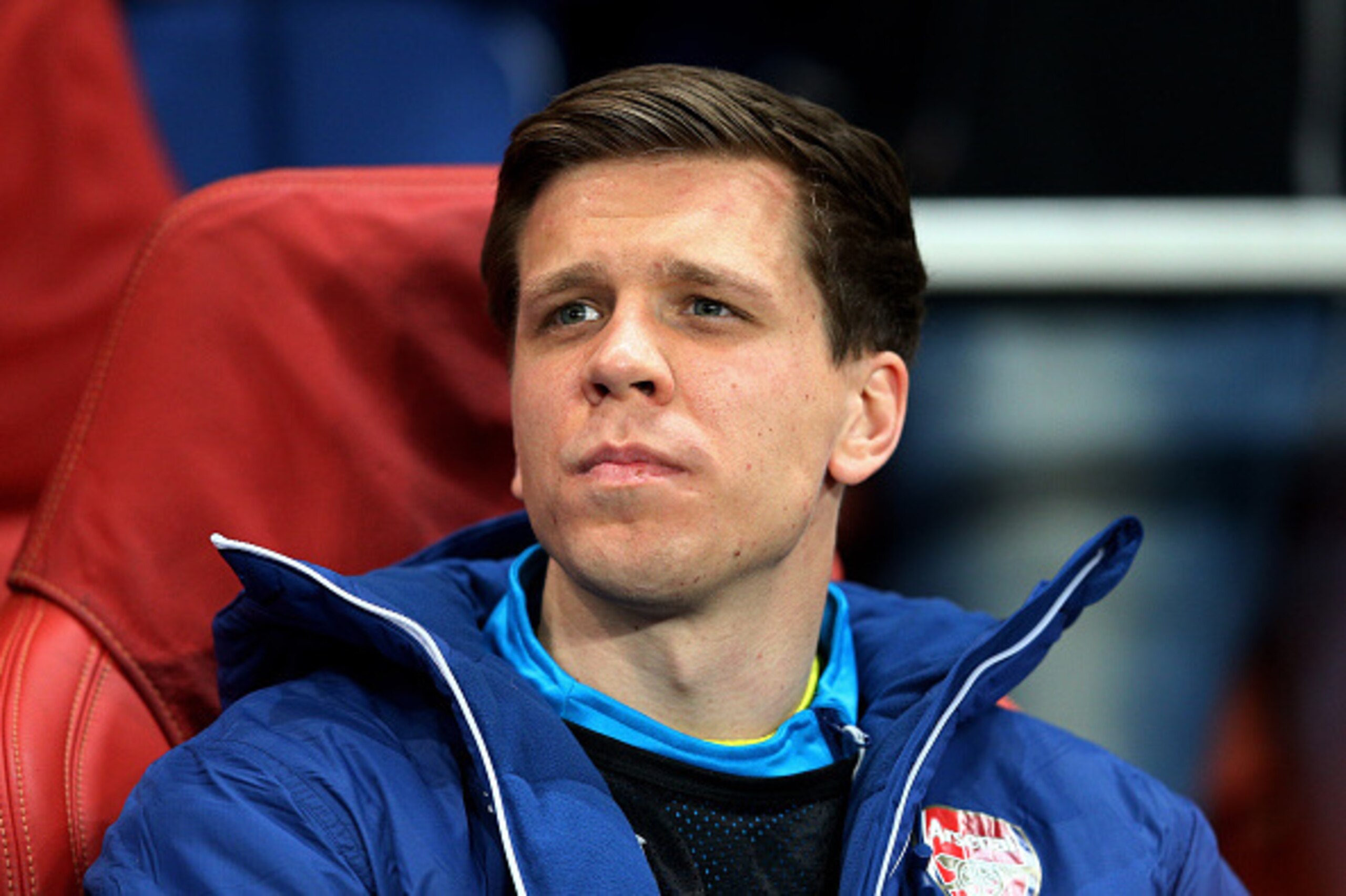 LONDON, ENGLAND - FEBRUARY 25: Goalkeeper Wojciech Szczesny of Arsenal looks on from the substitutes bench during the UEFA Champions League round of 16, first leg match between Arsenal and Monaco at The Emirates Stadium on February 25, 2015 in London, U LONDON, ENGLAND - FEBRUARY 25: Goalkeeper Wojciech Szczesny of Arsenal looks on from the substitutes bench during the UEFA Champions League round of 16, first leg match between Arsenal and Monaco at The Emirates Stadium on February 25, 2015 in London, U