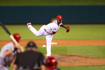 ST. LOUIS, MO - AUGUST 9: Alex Reyes #61 of the St. Louis Cardinals pitches against the Cincinnati Reds at Busch Stadium on August 9, 2016 in St. Louis, Missouri.  (Photo by Dilip Vishwanat/Getty Images)