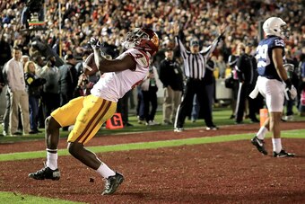 PASADENA, CA - JANUARY 02:  Running back Ronald Jones II #4 of the USC Trojans celebrates after scoring a touchdown in the fourth quarter against the Penn State Nittany Lions during the 2017 Rose Bowl Game presented by Northwestern Mutual at the Rose Bowl