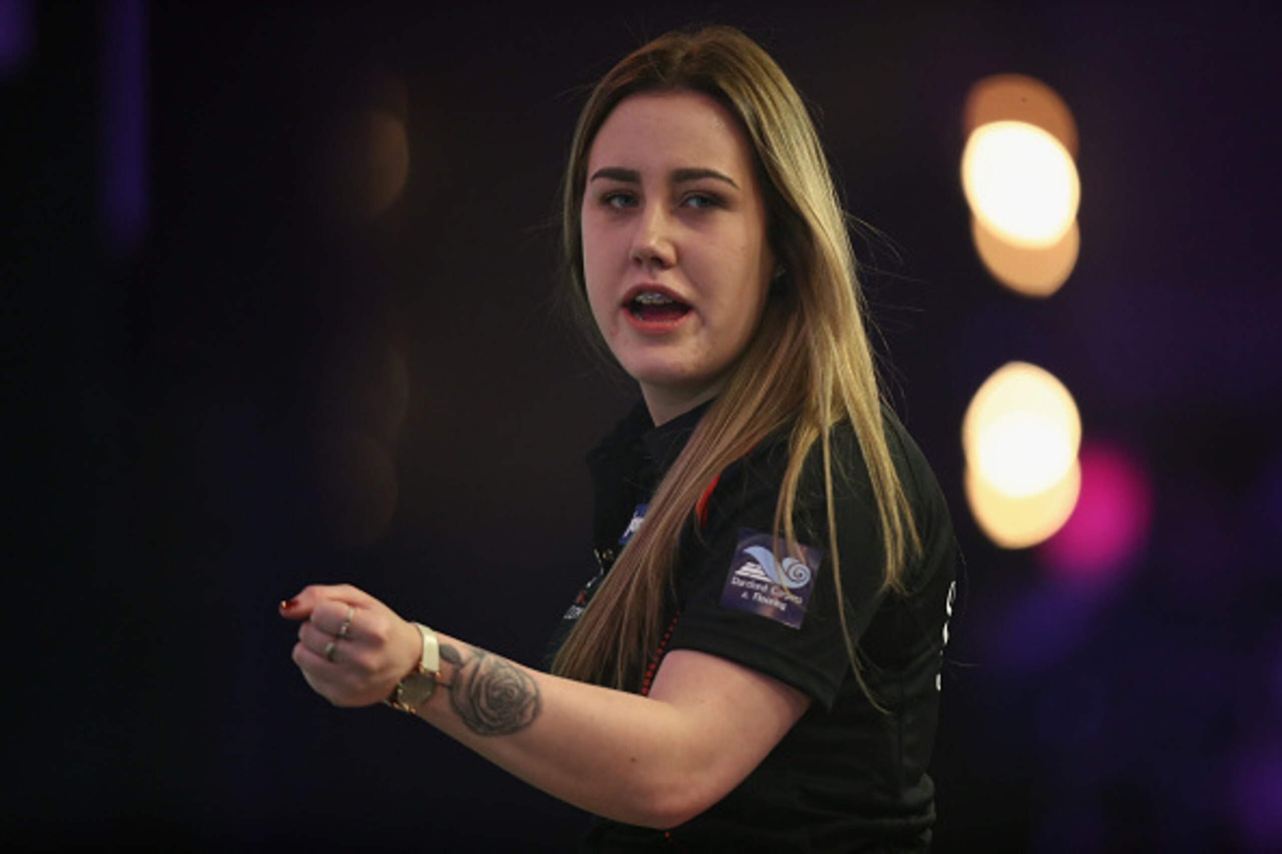 FRIMLEY, ENGLAND - JANUARY 10:  Casey Gallagher of Great Britain reacts during her first round match on day four of the BDO Lakeside World Professional Darts Championships on January 10, 2017 in Frimley, England.  (Photo by Bryn Lennon/Getty Images)