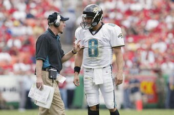 KANSAS CITY, MO - SEPTEMBER 15:  Quarterback Mark Brunell #8 of the Jacksonville Jaguars listens to head coach Tom Coughlin during the NFL game against the Kansas City Chiefs on September 15, 2002, at Arrowhead Stadium in Kansas City, Missouri.  The Jagua