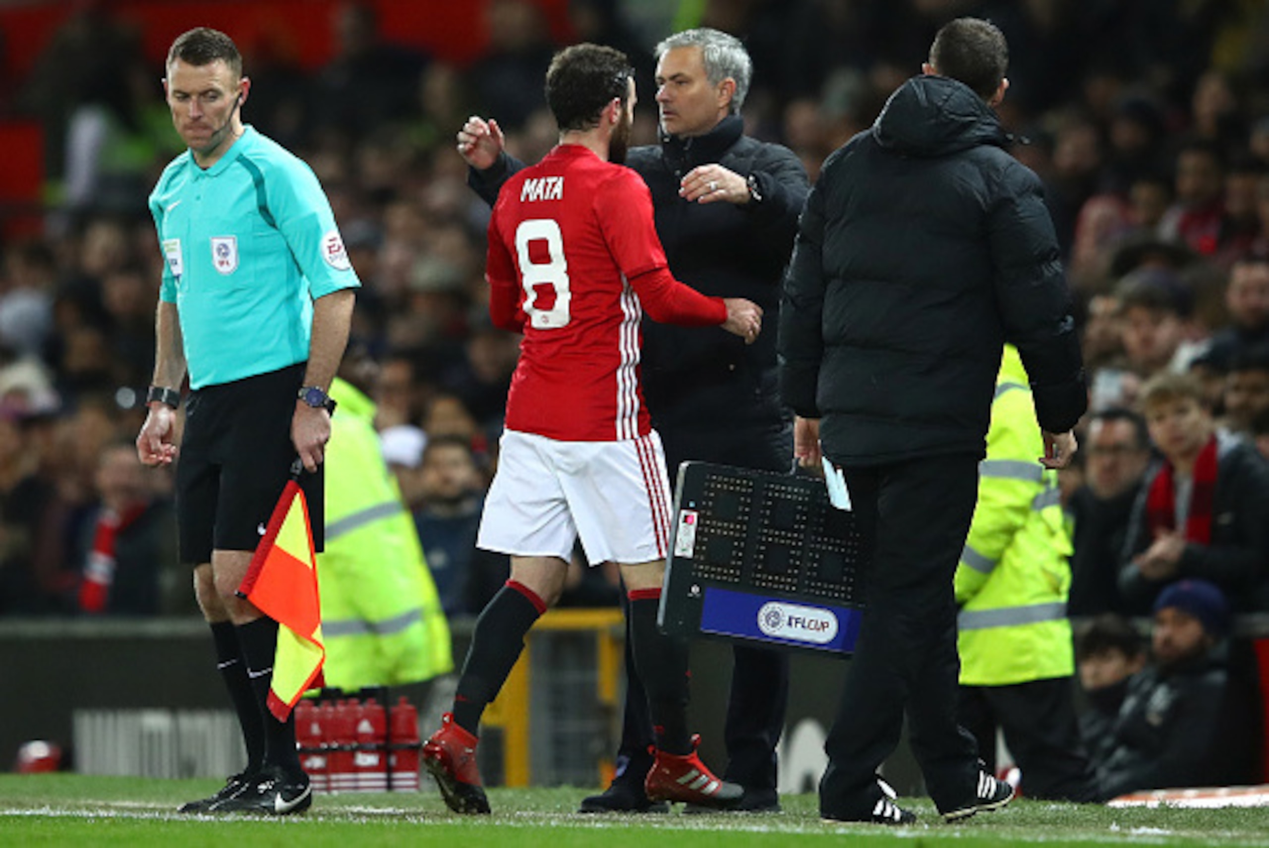 MANCHESTER, ENGLAND - JANUARY 10: Juan Mata of Manchester United speaks to Jose Mourinho, Manager of Manchester United as he is subtituted during the EFL Cup Semi-Final First Leg match between Manchester United and Hull City at Old Trafford on January 10 MANCHESTER, ENGLAND - JANUARY 10: Juan Mata of Manchester United speaks to Jose Mourinho, Manager of Manchester United as he is subtituted during the EFL Cup Semi-Final First Leg match between Manchester United and Hull City at Old Trafford on January 10