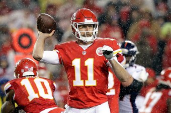 KANSAS CITY, MO - DECEMBER 25:  Quarterback Alex Smith #11 of the Kansas City Chiefs passes during the game against the Denver Broncos at Arrowhead Stadium on December 25, 2016 in Kansas City, Missouri.  (Photo by Jason Hanna/Getty Images)