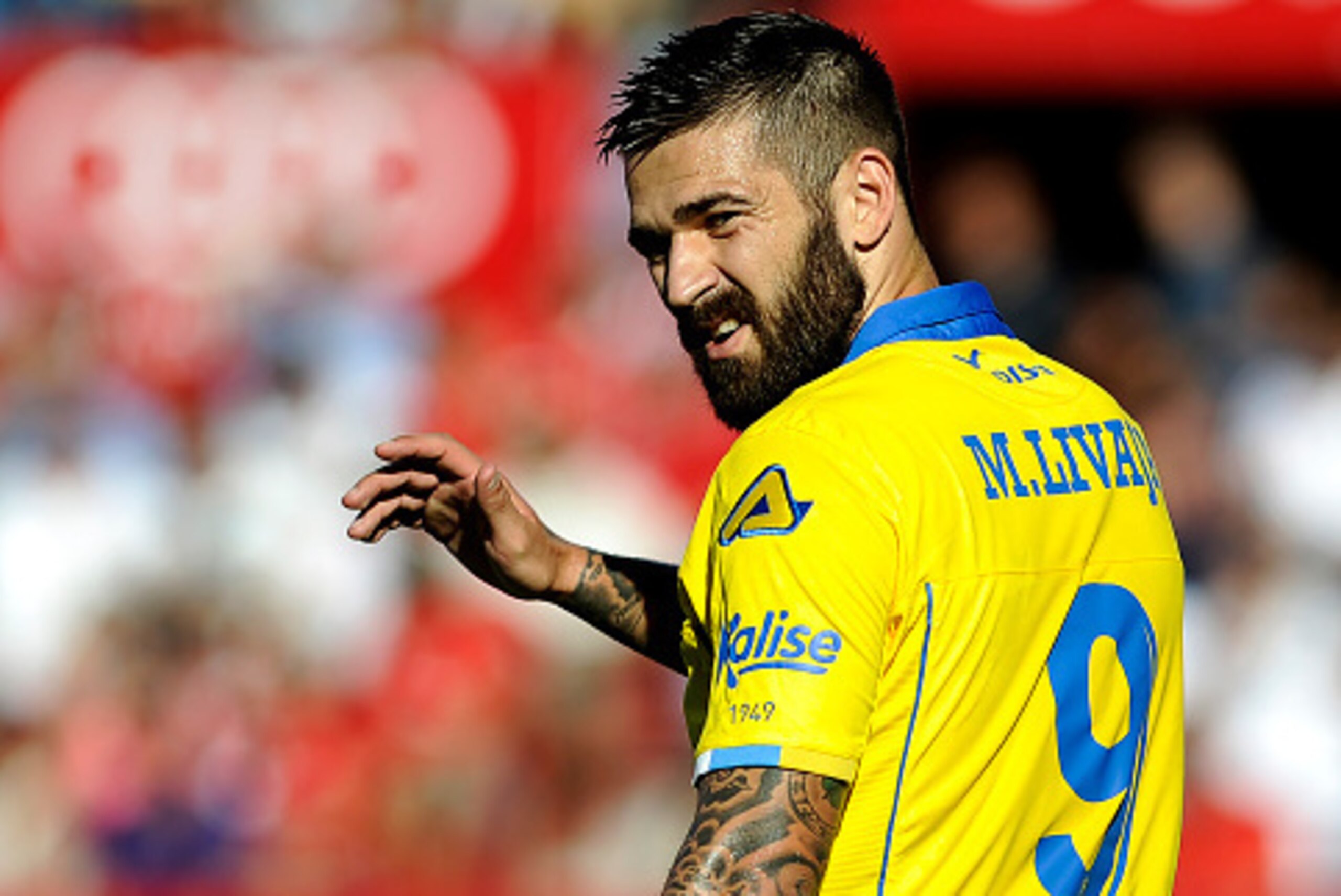 Las Palmas' Croatian forward Marko Livaja gestures during the Spanish league football match Sevilla FC vs UD Las Palmas at the Ramon Sanchez Pizjuan stadium in Sevilla on September 10, 2016. / AFP / CRISTINA QUICLER        (Photo credit should read CRISTI