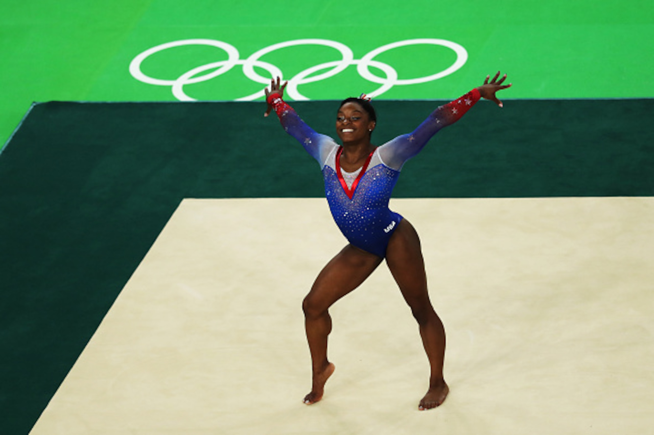 RIO DE JANEIRO, BRAZIL - AUGUST 16: Simone Biles of the United States competes during the Women's Floor Final at Rio Olympic Arena on August 16, 2016 in Rio de Janeiro, Brazil. (Photo by Ian MacNicol/Getty Images) RIO DE JANEIRO, BRAZIL - AUGUST 16: Simone Biles of the United States competes during the Women's Floor Final at Rio Olympic Arena on August 16, 2016 in Rio de Janeiro, Brazil. (Photo by Ian MacNicol/Getty Images)