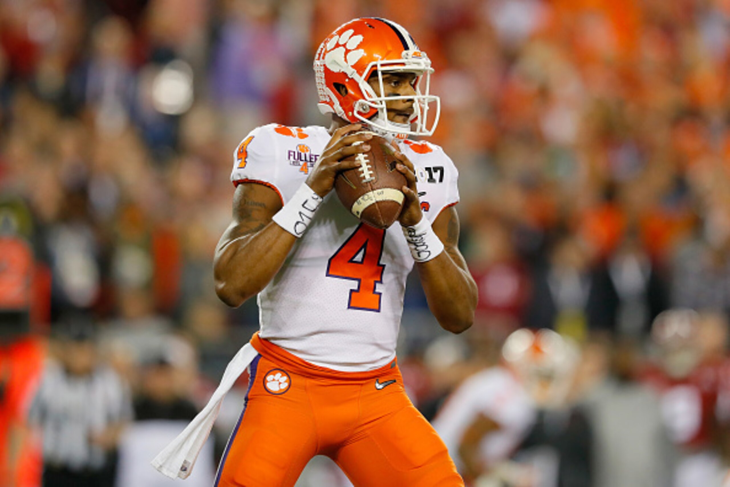 TAMPA, FL - JANUARY 09:  Quarterback Deshaun Watson #4 of the Clemson Tigers looks to pass during the first half against the Alabama Crimson Tide in the 2017 College Football Playoff National Championship Game at Raymond James Stadium on January 9, 2017 i
