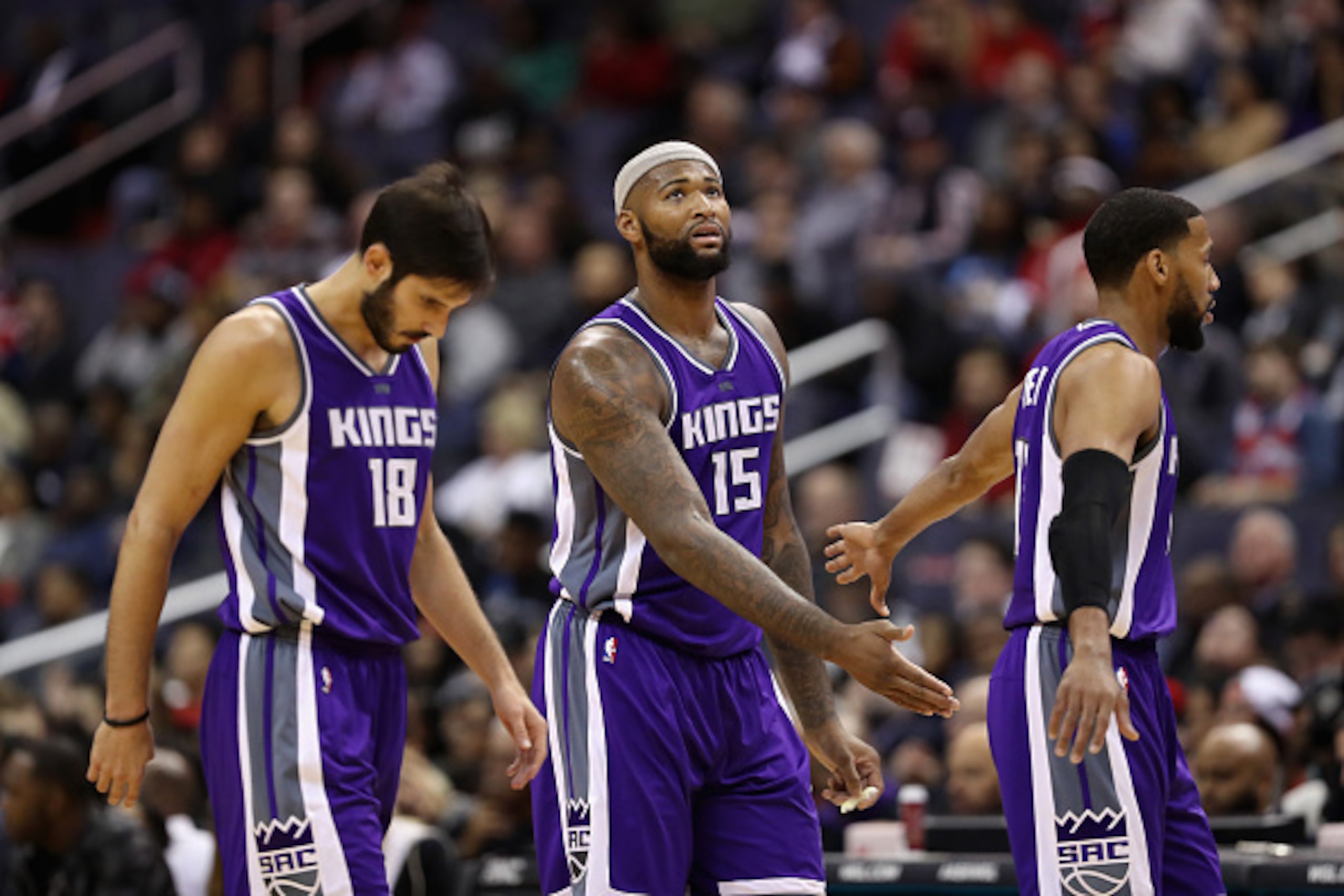 WASHINGTON, DC - NOVEMBER 28: Omri Casspi #18, DeMarcus Cousins #15 and Garrett Temple #17 of the Sacramento Kings walk off the floor during a timeout against the Washington Wizards at Verizon Center on November 28, 2016 in Washington, DC. NOTE TO USER: U WASHINGTON, DC - NOVEMBER 28: Omri Casspi #18, DeMarcus Cousins #15 and Garrett Temple #17 of the Sacramento Kings walk off the floor during a timeout against the Washington Wizards at Verizon Center on November 28, 2016 in Washington, DC. NOTE TO USER: U