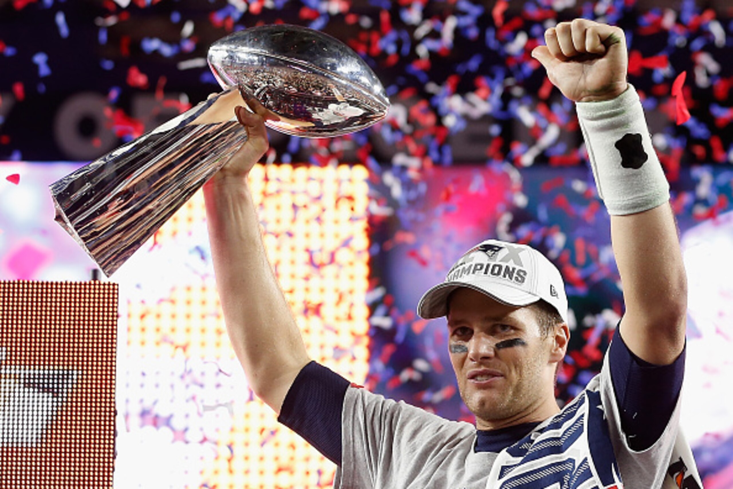 GLENDALE, AZ - FEBRUARY 01:  Tom Brady #12 of the New England Patriots celebrates with the Vince Lombardi Trophy after defeating the Seattle Seahawks 28-24 to win Super Bowl XLIX at University of Phoenix Stadium on February 1, 2015 in Glendale, Arizona.  